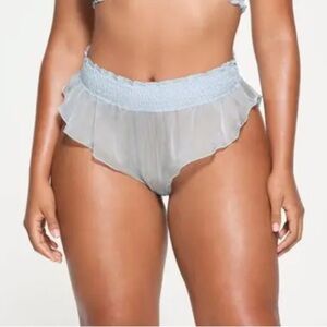 NWT SKIMS romance smocked flutter thong in Celeste